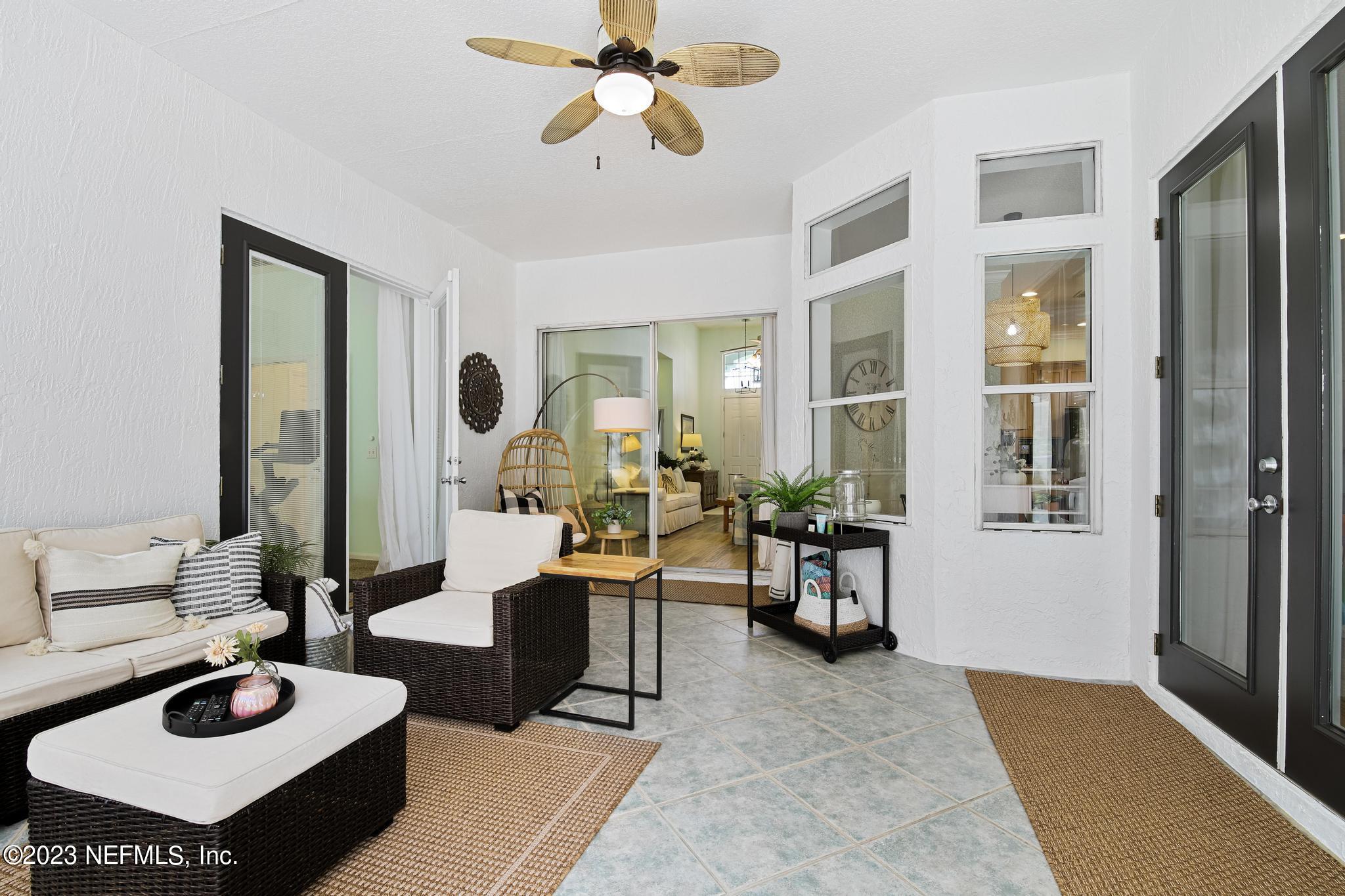 3926 Danforth Drive West Jacksonville, FL 32224 - Photo 25 of 35 a living room with furniture and wooden floor