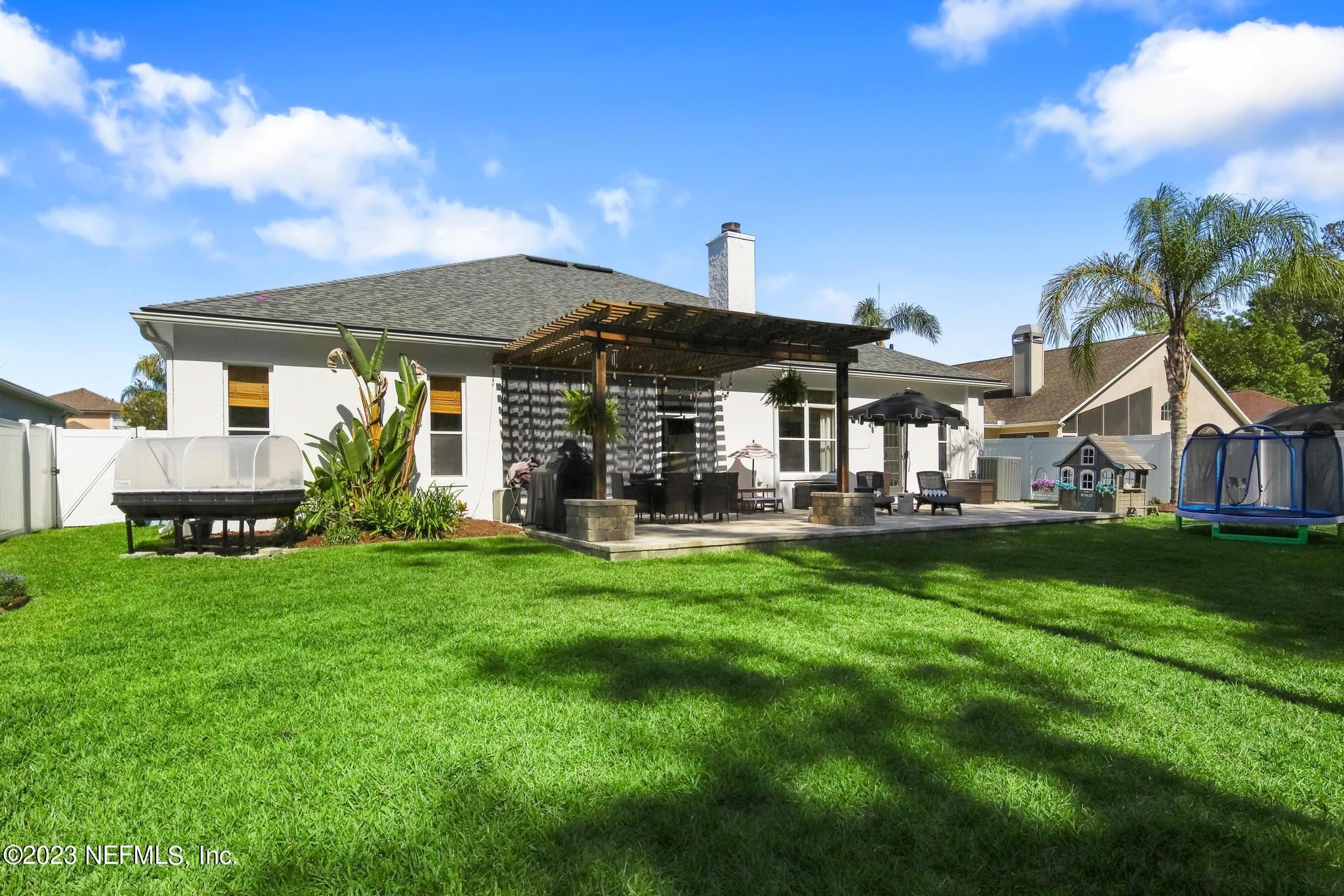 3926 Danforth Drive West Jacksonville, FL 32224 - Photo 28 of 35 a view of house with garden