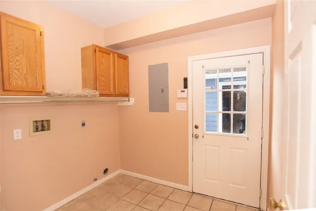 a view of a closet area with an empty room