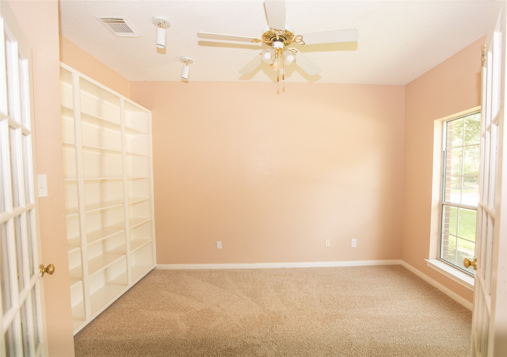 8615 Mile Run Road Humble, TX 77346 - Photo 6 of 16 a view of an empty room