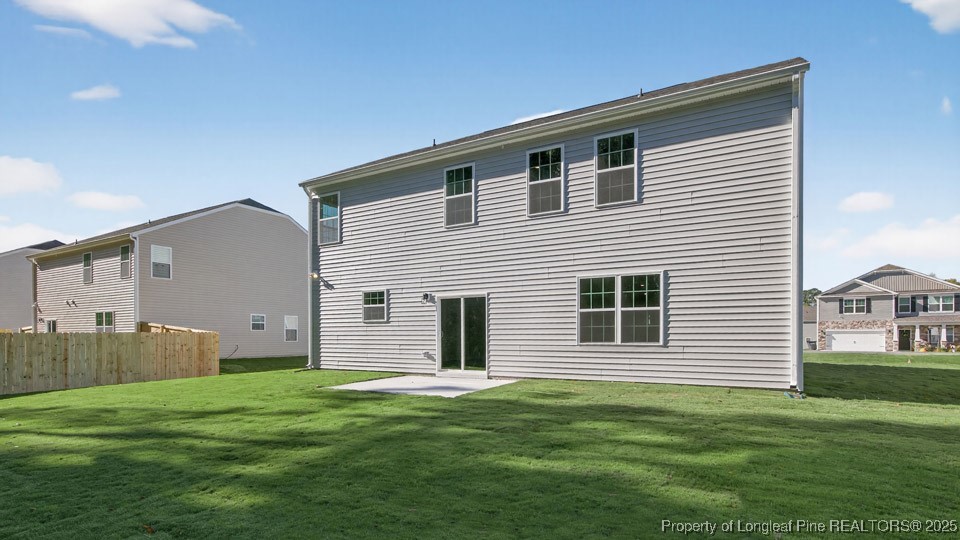 3034 Bayview Drive Vass, NC 28394 - Photo 42 of 47 a front view of a house with a garden