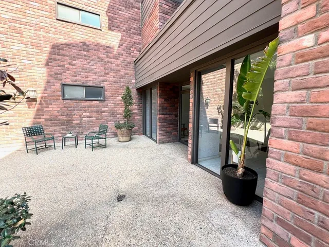 a backyard of a house with seating space