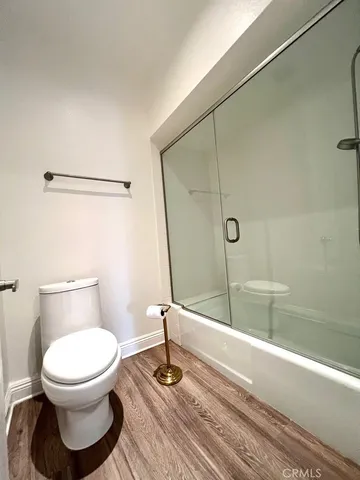 a view of a storage & utility room with a washer dryer