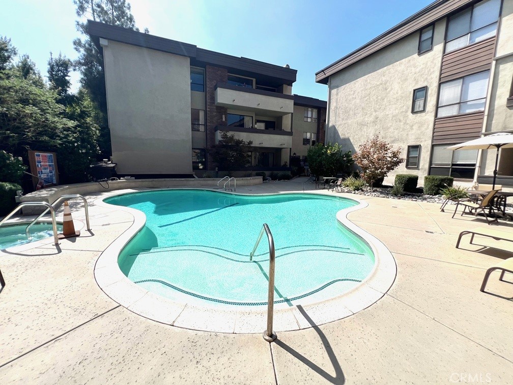 700 South Lake Avenue, Unit 111 Pasadena, CA 91106 - Photo 38 of 40 a view of a swimming pool with sitting area