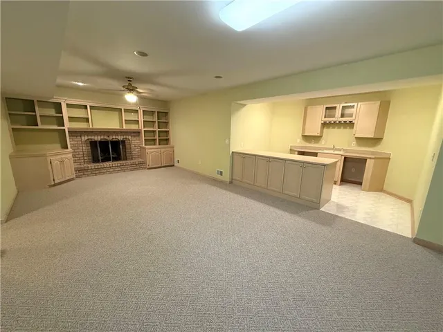 a view of a kitchen with furniture and a kitchen