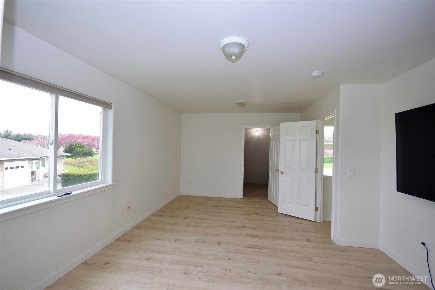 71 John Carl Road Sequim, WA 98382 - Photo 26 of 37 a view of an empty room with a window and bathroom