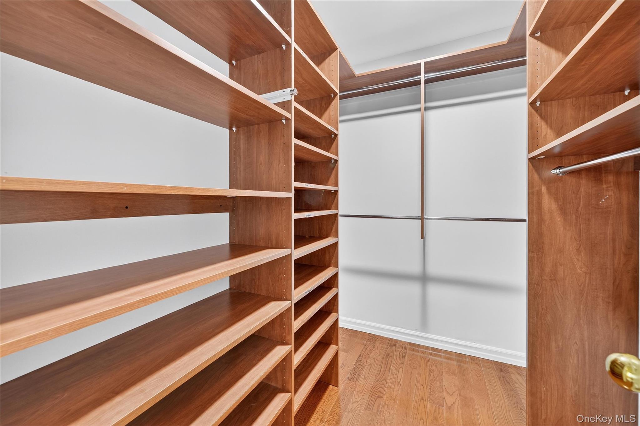 57 Boulder Ridge Road Scarsdale, NY 10583 - Photo 16 of 49 a view of walk in closet with empty racks