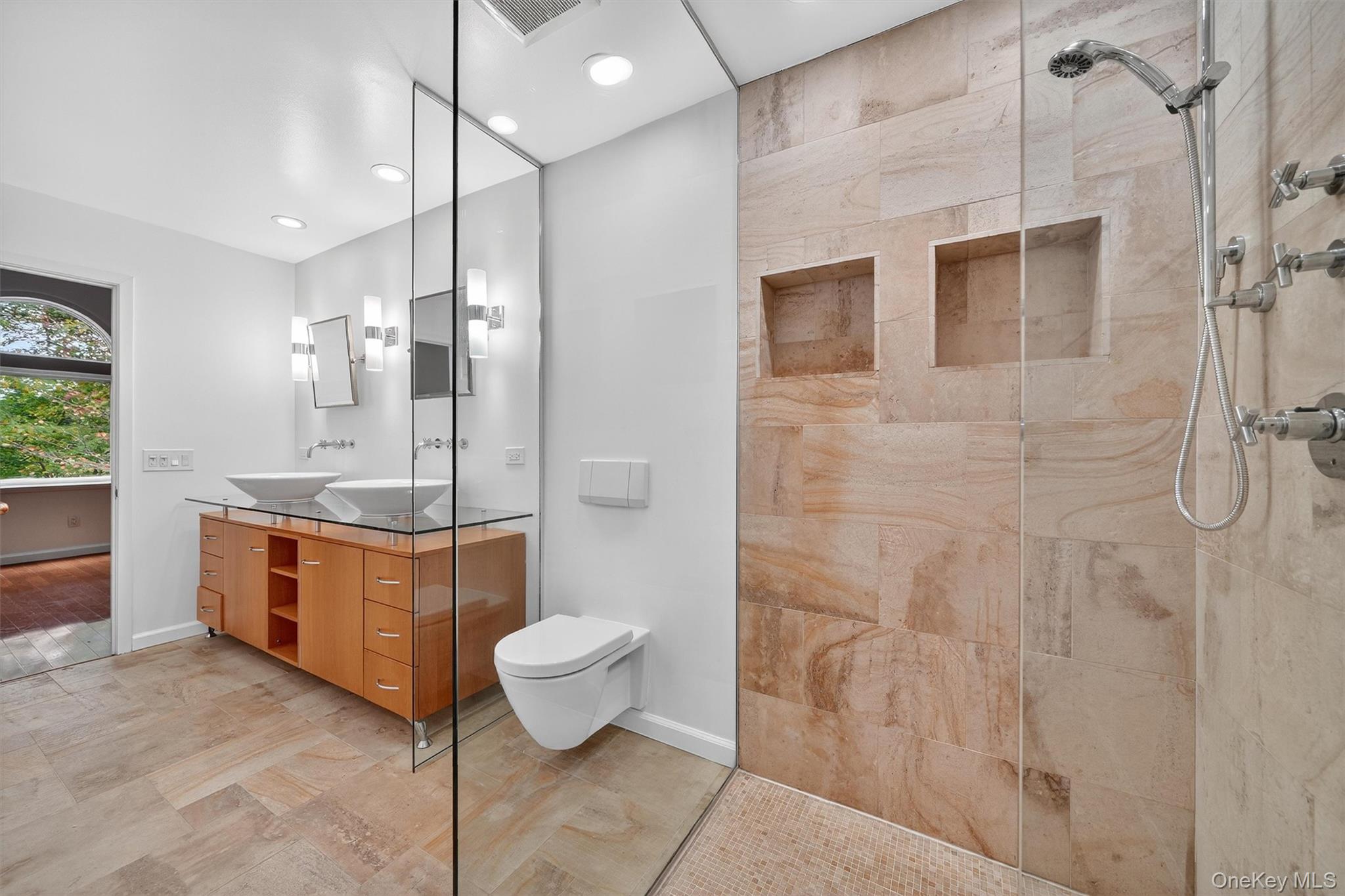 57 Boulder Ridge Road Scarsdale, NY 10583 - Photo 18 of 49 a large bathroom with a granite countertop sink a toilet a mirror and shower