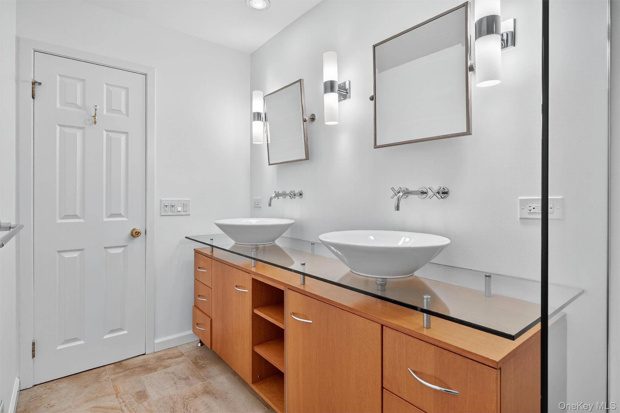 57 Boulder Ridge Road Scarsdale, NY 10583 - Photo 19 of 49 a bathroom with a granite countertop sink and a mirror