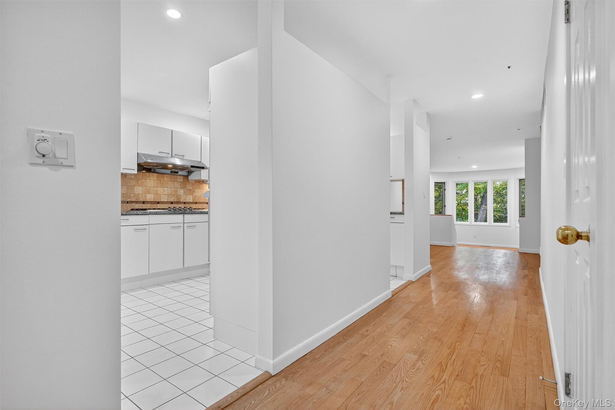 57 Boulder Ridge Road Scarsdale, NY 10583 - Photo 3 of 49 a view of a kitchen cabinets and wooden floor