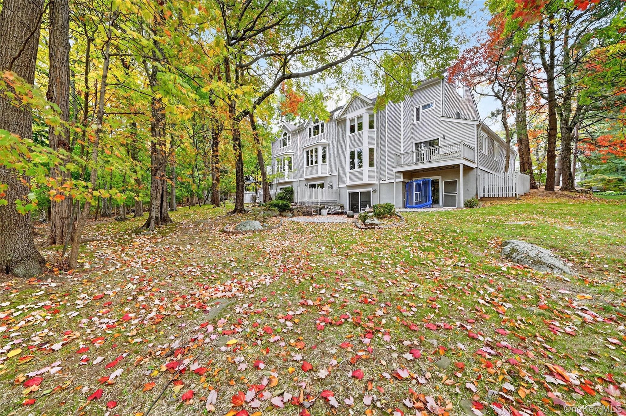 57 Boulder Ridge Road Scarsdale, NY 10583 - Photo 36 of 49 a view of house with yard
