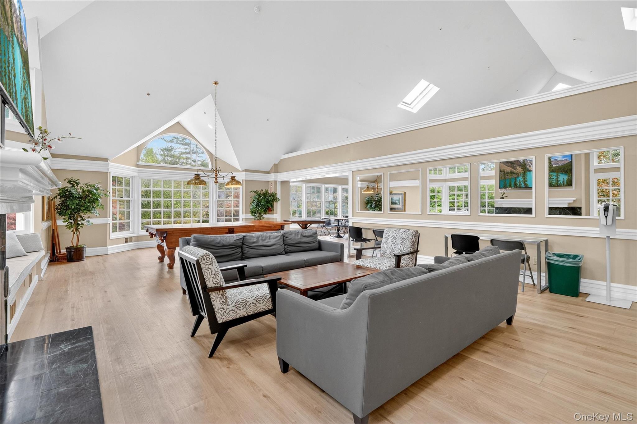 57 Boulder Ridge Road Scarsdale, NY 10583 - Photo 41 of 49 a living room with furniture and a large window
