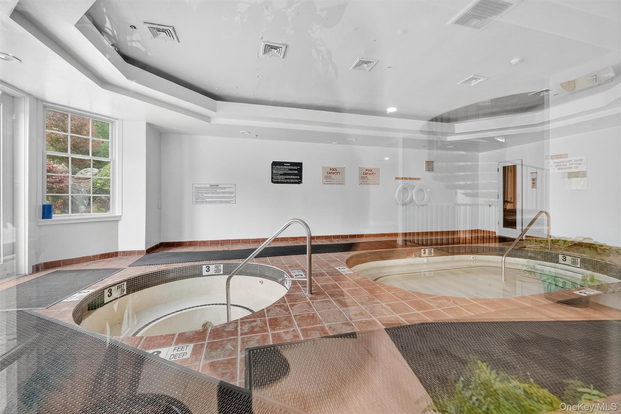 57 Boulder Ridge Road Scarsdale, NY 10583 - Photo 46 of 49 a very nice looking rest room with a large window