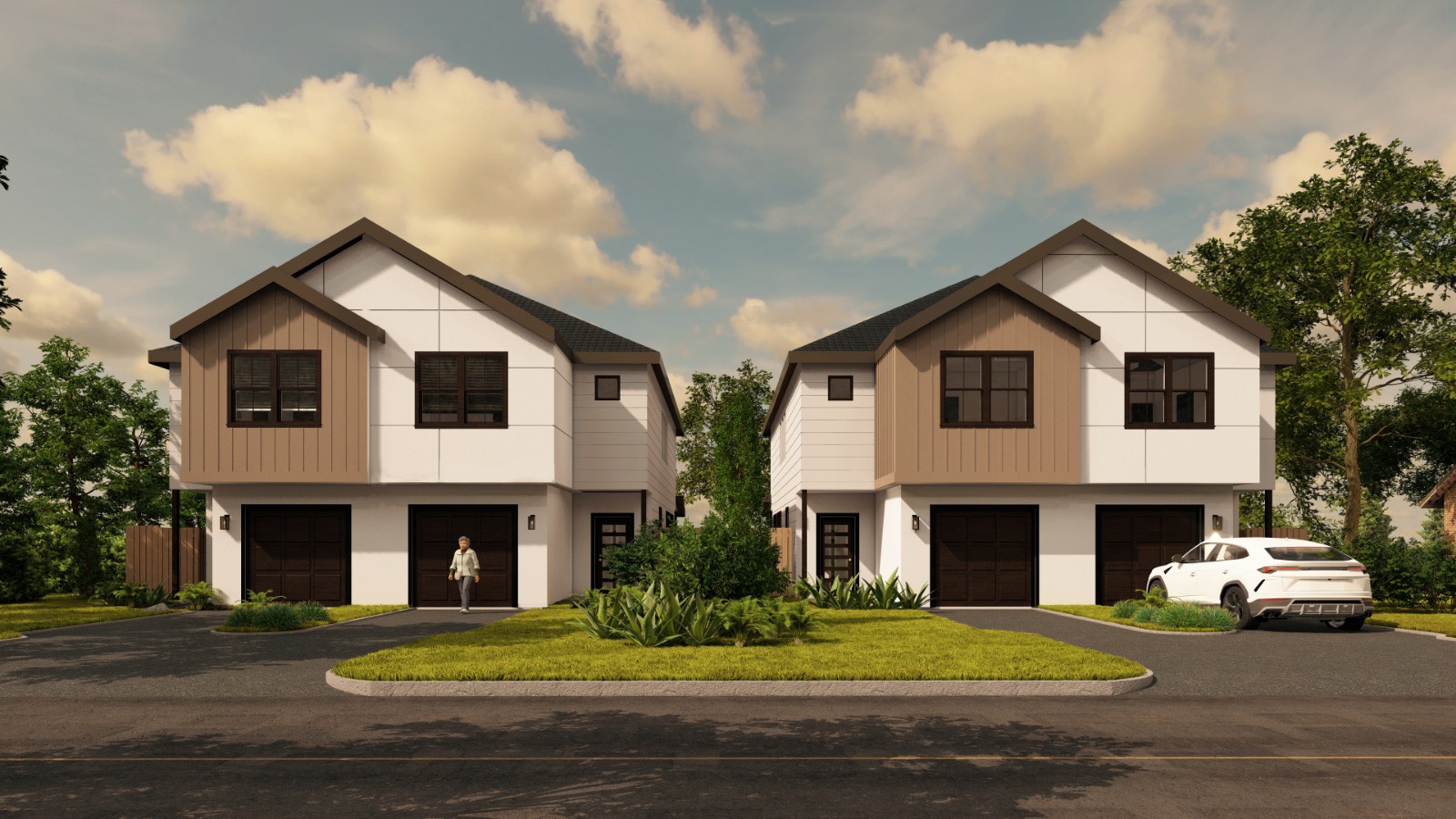 a front view of a house with a garden