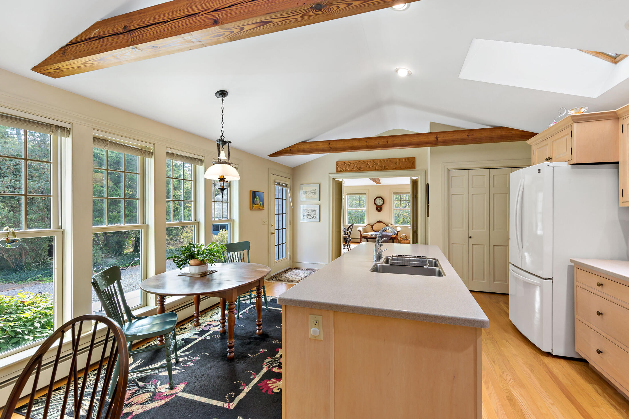 645 Samoset Road Eastham, MA 02642 - Photo 12 of 49 a dining room with furniture and window