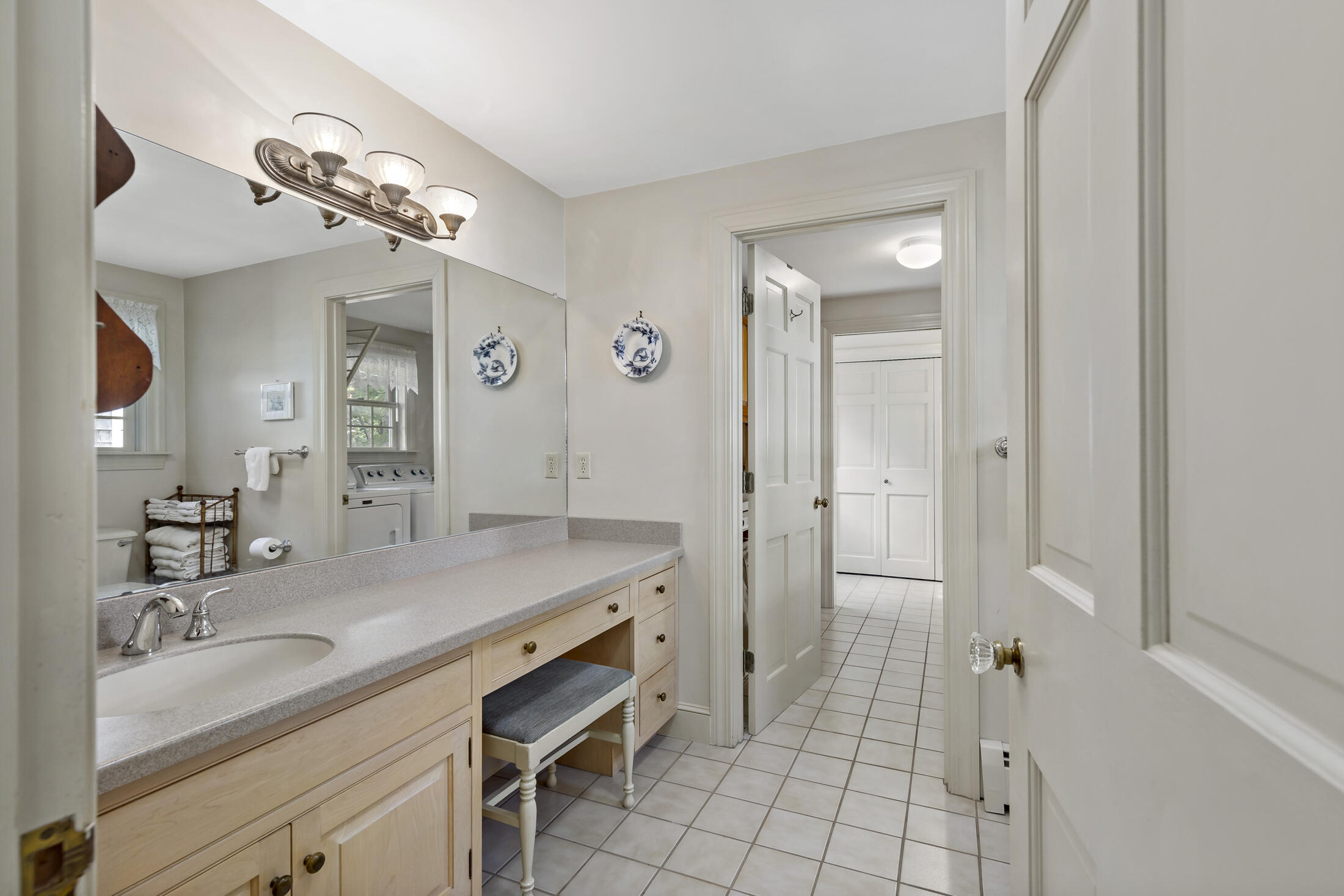 645 Samoset Road Eastham, MA 02642 - Photo 30 of 49 a bathroom with a sink a vanity a mirror and a shower