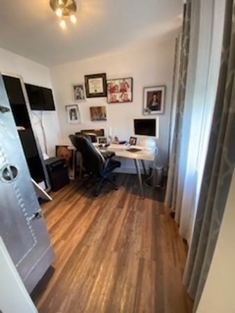 1 Surfside Road Scituate, MA 02066 - Photo 16 of 32 a living room with furniture and a flat screen tv