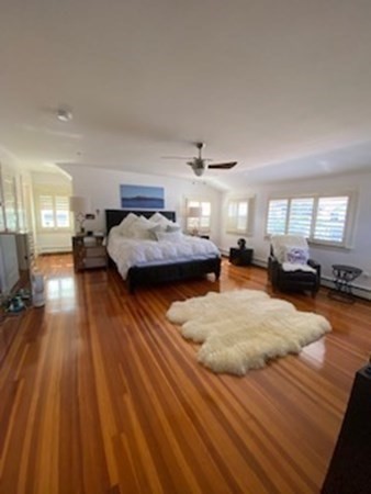 1 Surfside Road Scituate, MA 02066 - Photo 22 of 32 a living room with furniture and a wooden floor