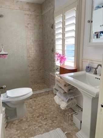 1 Surfside Road Scituate, MA 02066 - Photo 23 of 32 a bathroom with a sink toilet and window