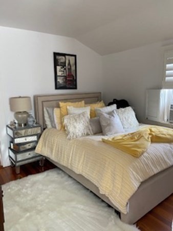 1 Surfside Road Scituate, MA 02066 - Photo 26 of 32 a bedroom with a bed and painting on the wall