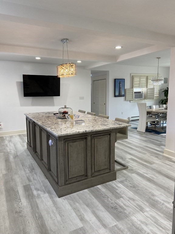 1 Surfside Road Scituate, MA 02066 - Photo 5 of 32 a spacious bathroom with a granite countertop sink and a mirror