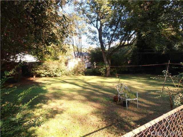 531 Scaleybark Road Charlotte, NC 28209 - Photo 14 of 14 a swimming pool with wooden fence