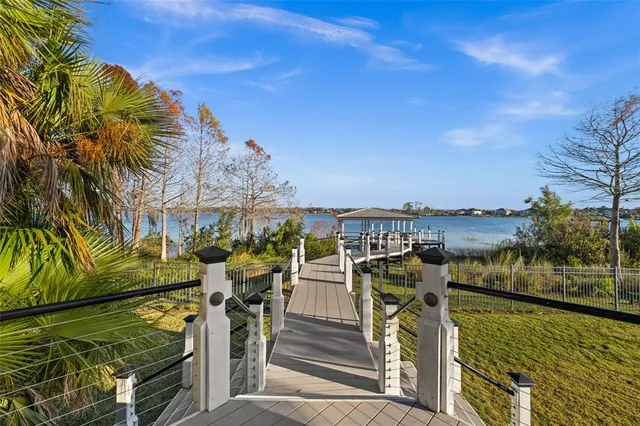a view of a balcony with ocean view