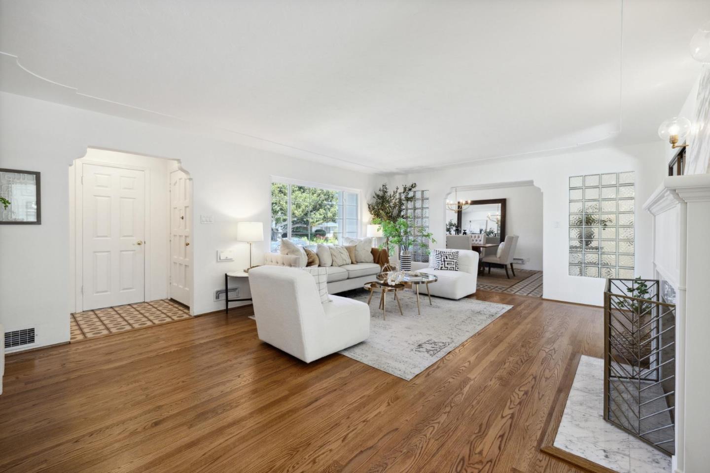 595 Anza Street Mountain View, CA 94041 - Photo 13 of 72 a living room with fireplace furniture and a wooden floor