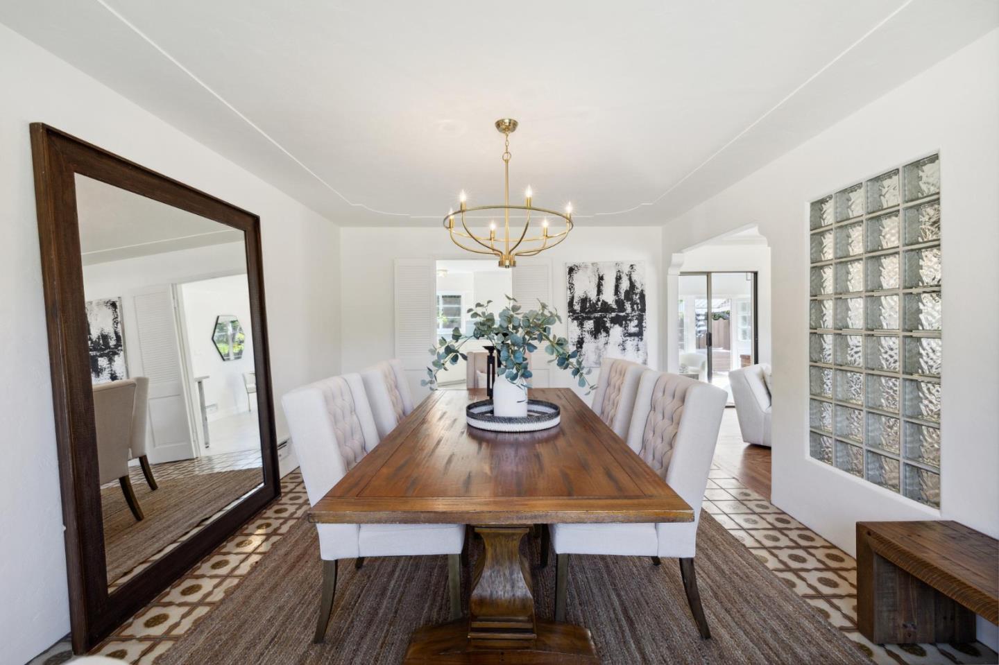 595 Anza Street Mountain View, CA 94041 - Photo 15 of 72 a view of a dining room with furniture window and wooden floor