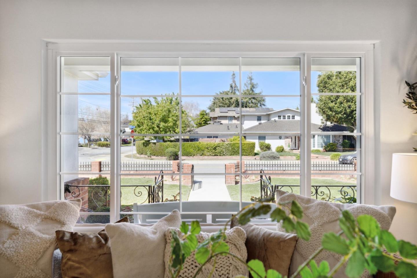 595 Anza Street Mountain View, CA 94041 - Photo 16 of 72 a living room with furniture and a large window
