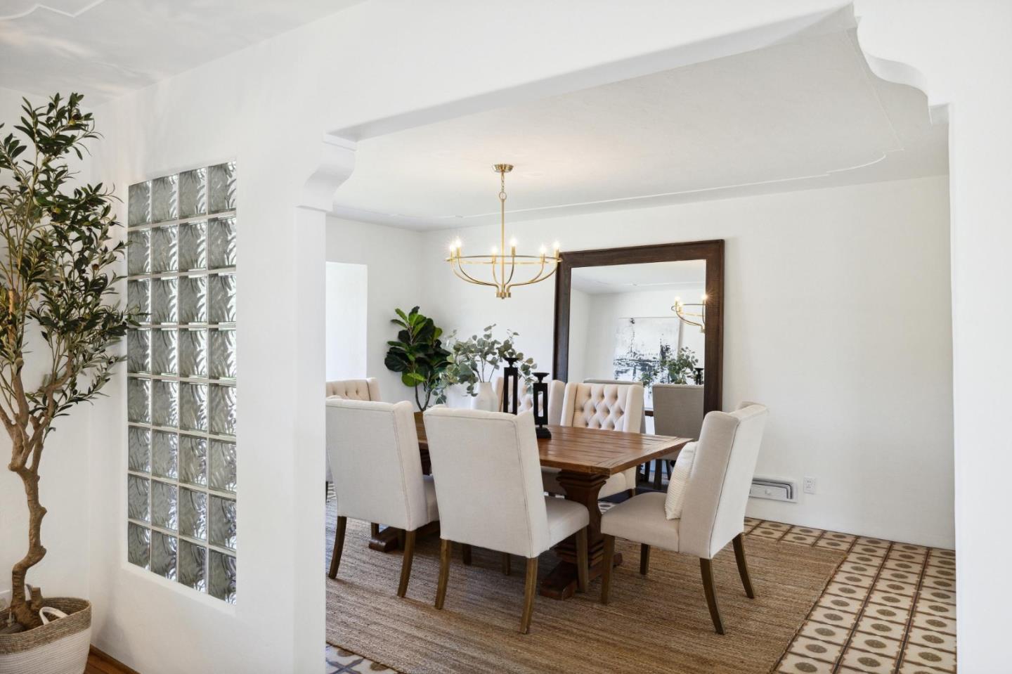 595 Anza Street Mountain View, CA 94041 - Photo 20 of 72 a dining room with furniture window and wooden floor