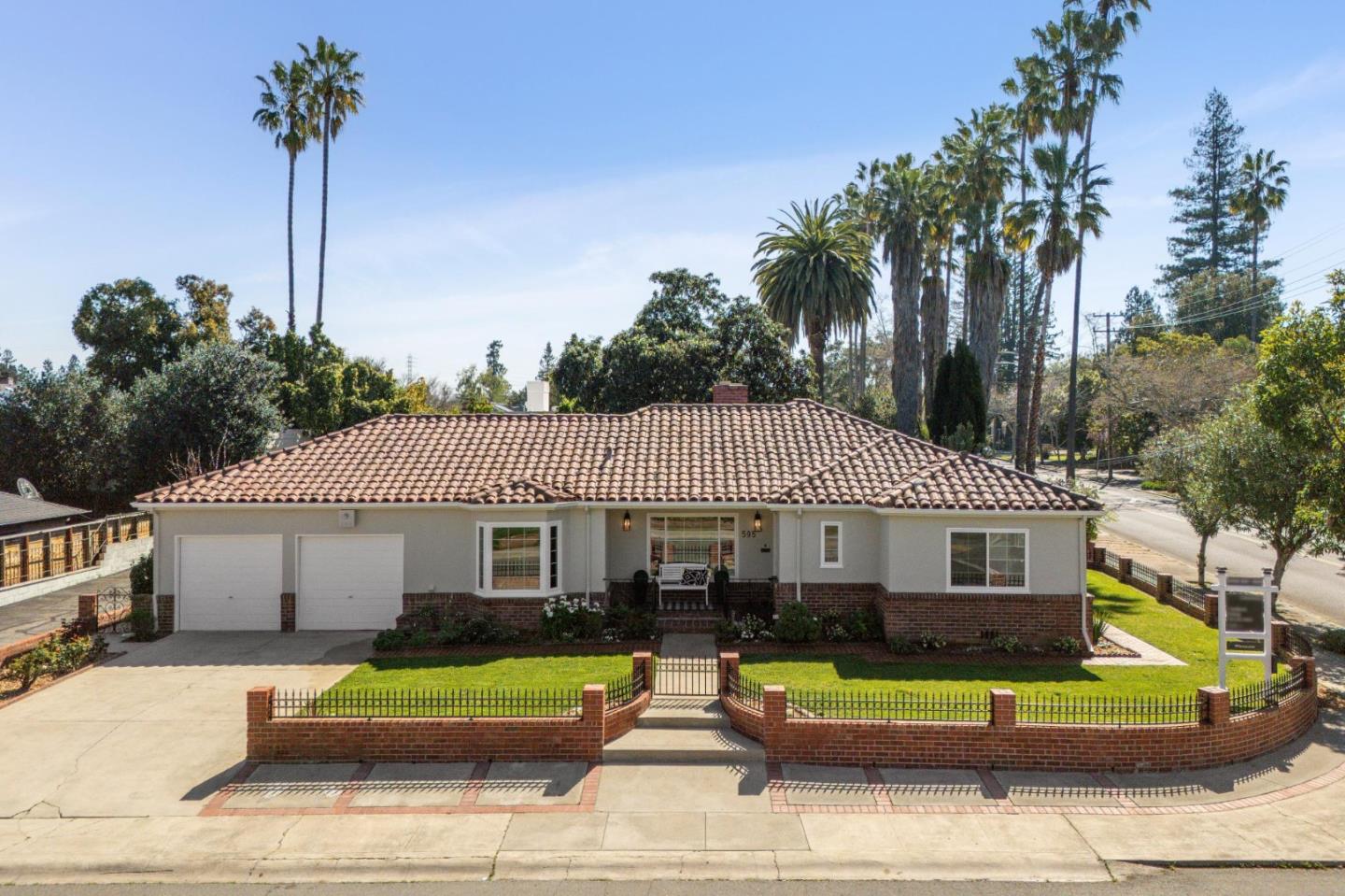 595 Anza Street Mountain View, CA 94041 - Photo 2 of 72 a front view of a house with garden