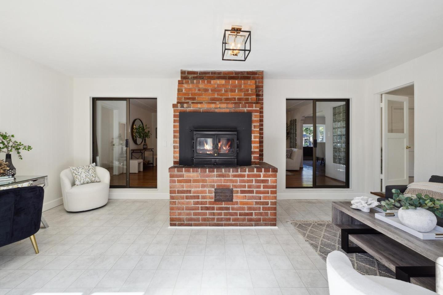 595 Anza Street Mountain View, CA 94041 - Photo 28 of 72 a living room with furniture a window and a fireplace