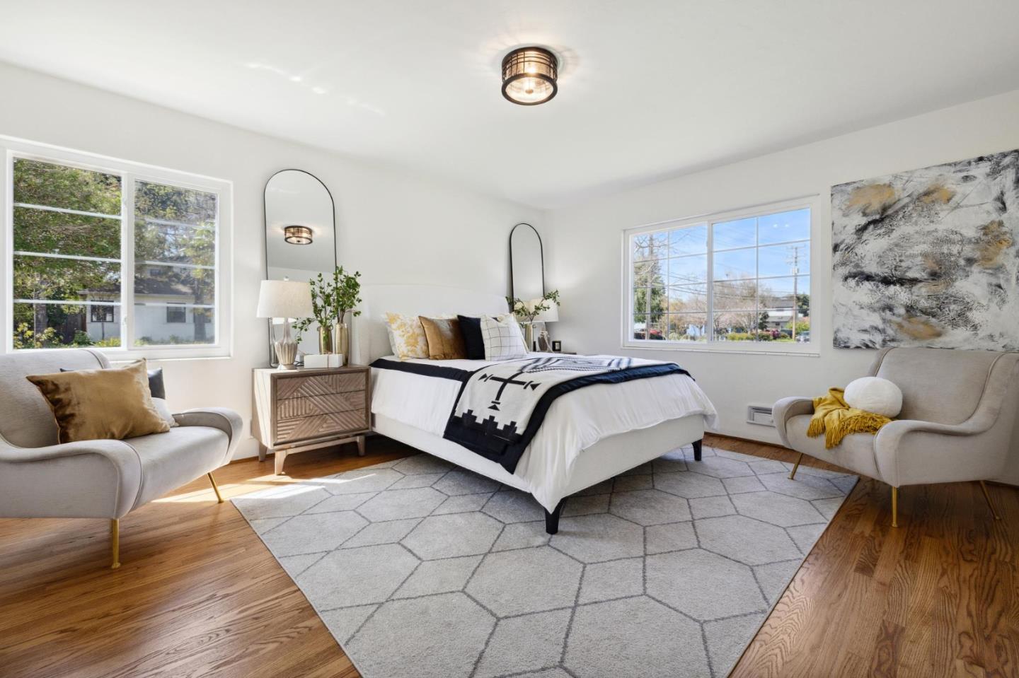 595 Anza Street Mountain View, CA 94041 - Photo 35 of 72 a bedroom with a bed and wooden floor