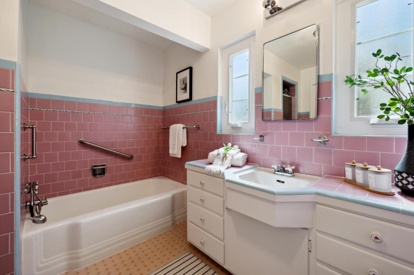 595 Anza Street Mountain View, CA 94041 - Photo 41 of 72 a bathroom with a tub sink and mirror