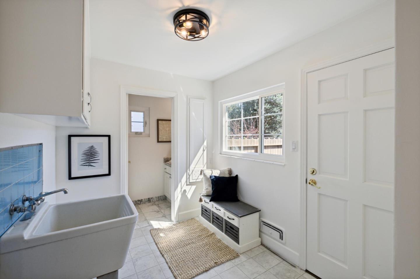 595 Anza Street Mountain View, CA 94041 - Photo 46 of 72 a living room with furniture and a window