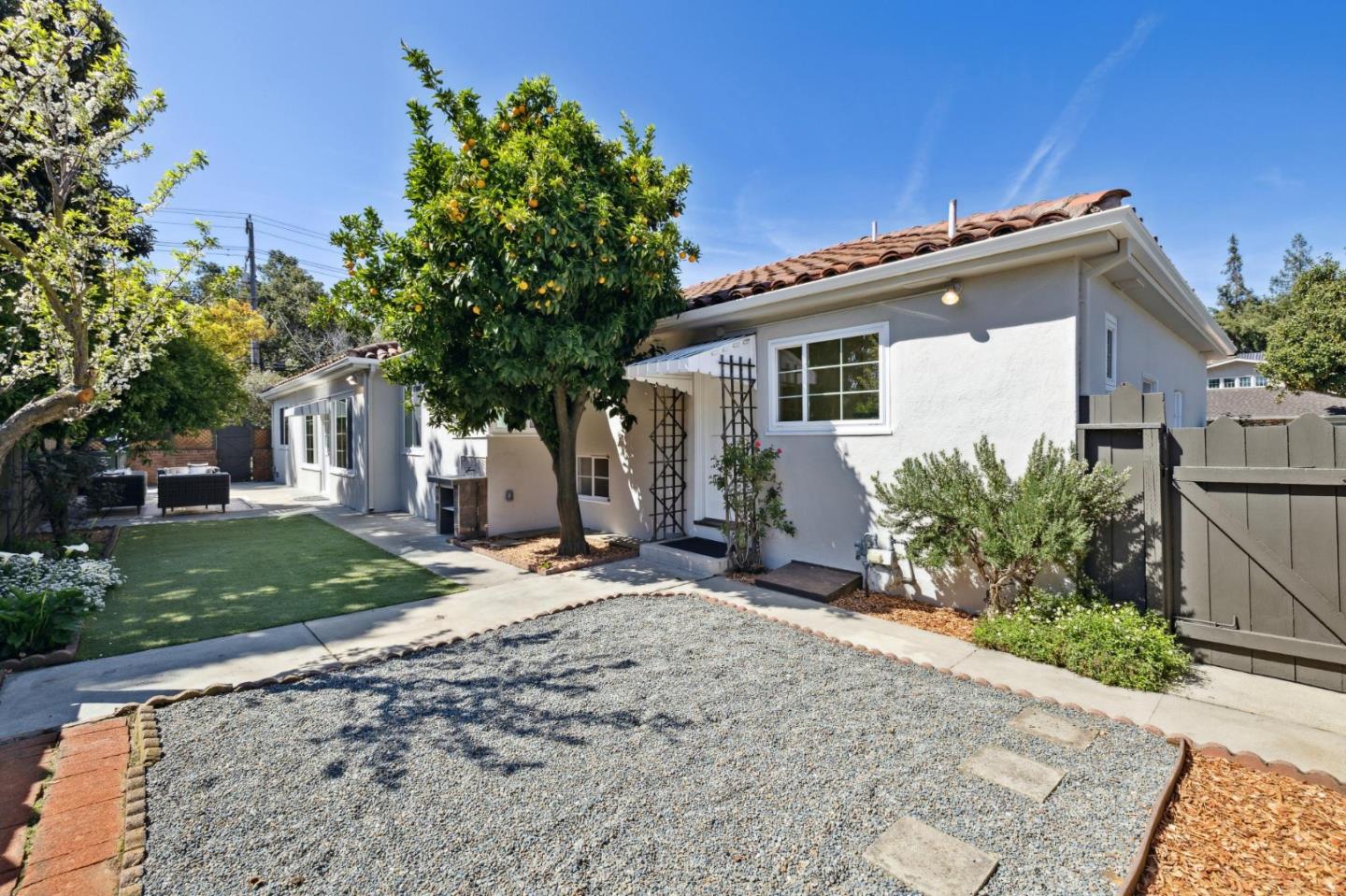 595 Anza Street Mountain View, CA 94041 - Photo 51 of 72 a front view of a house with a yard