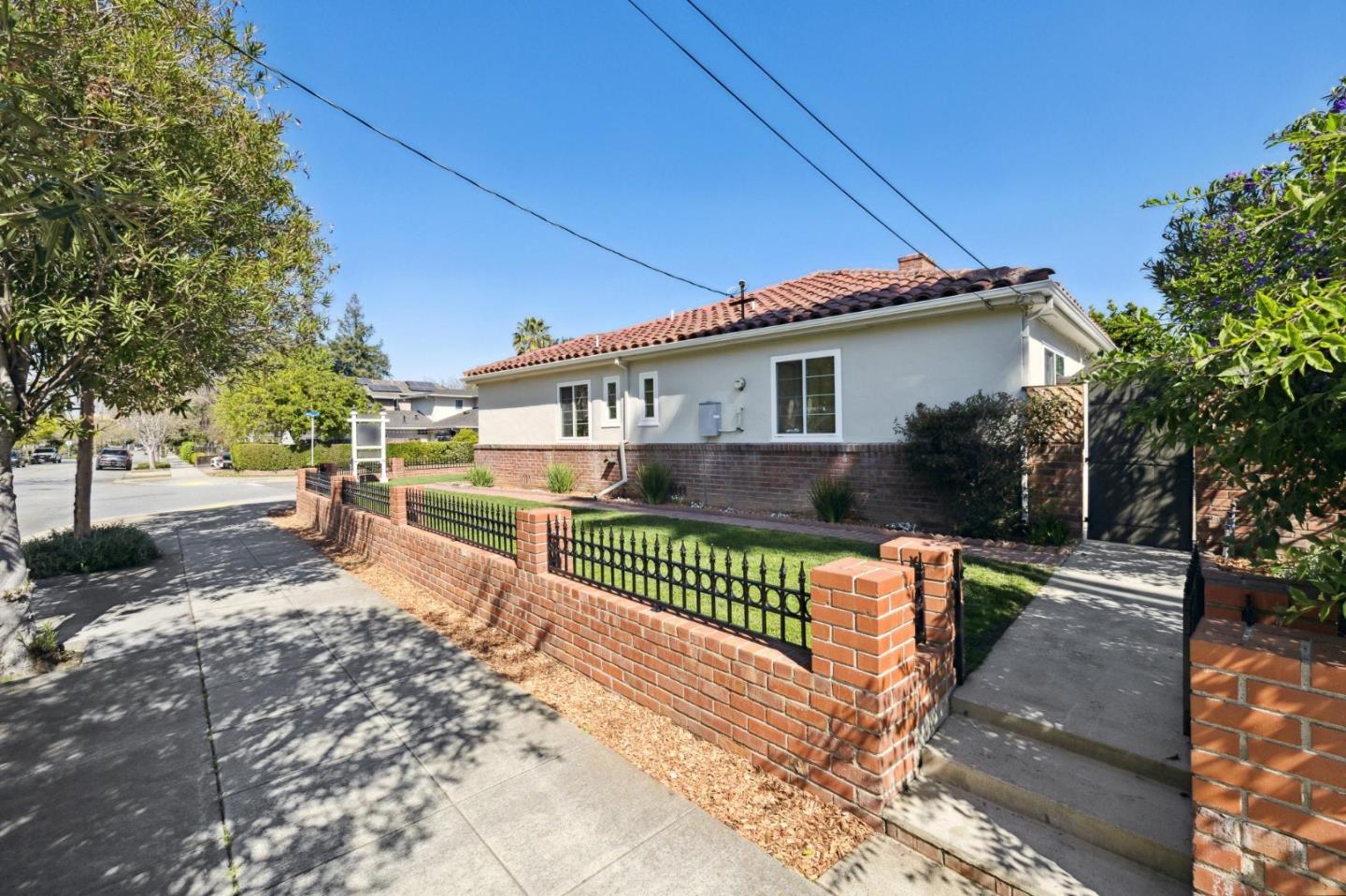 595 Anza Street Mountain View, CA 94041 - Photo 62 of 72 a view of a house with a small yard