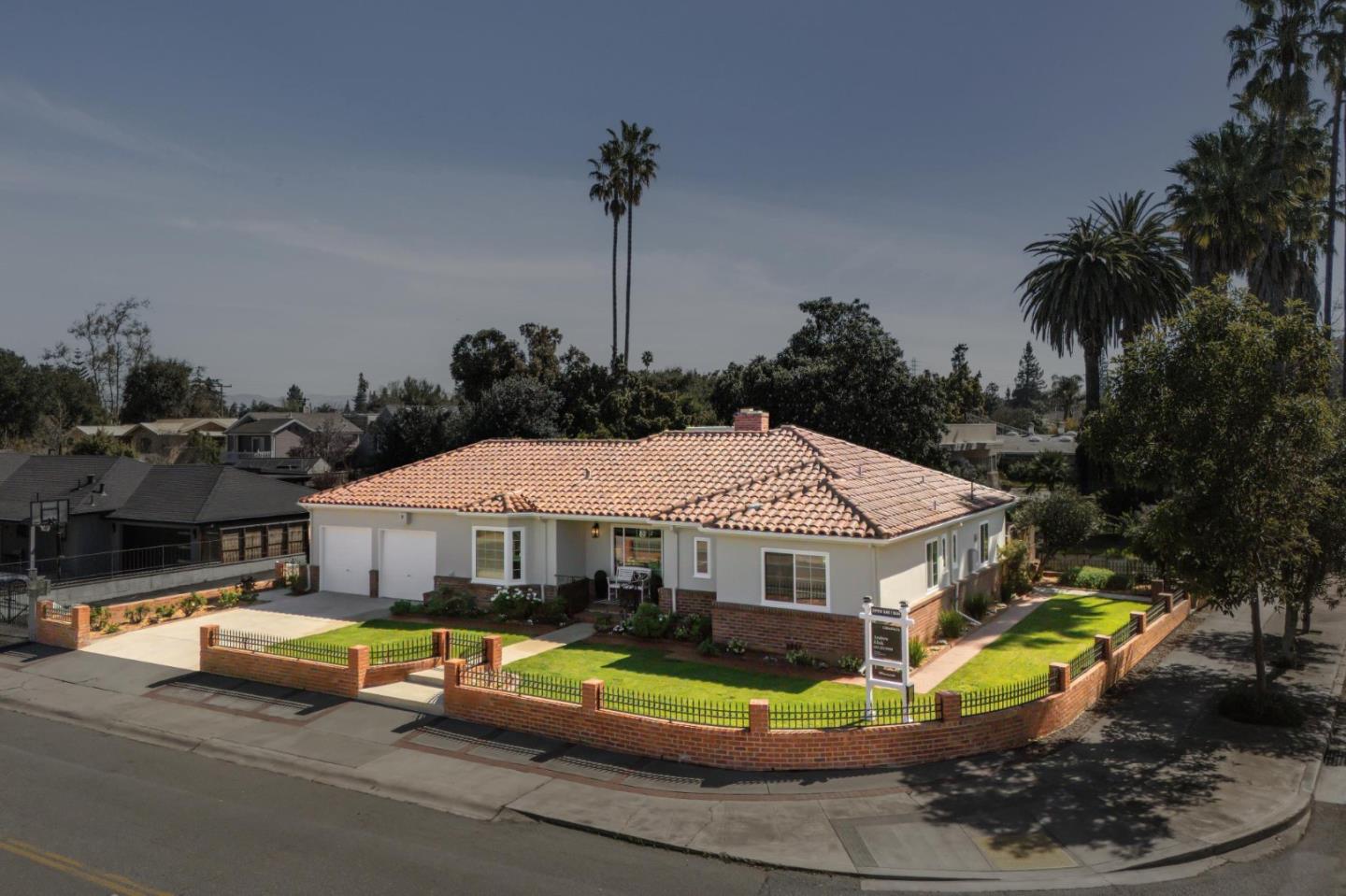 595 Anza Street Mountain View, CA 94041 - Photo 64 of 72 a aerial view of a house with swimming pool and big yard