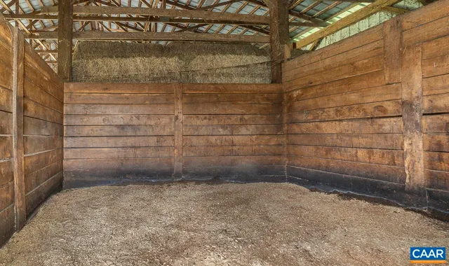 a view of a city with lush green forest