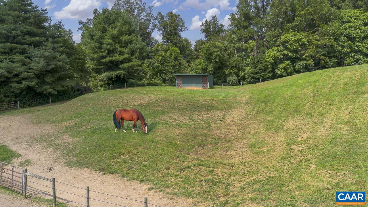 9195 Springwood Road Buchanan, VA 24066 - Photo 23 of 75 a backyard of a house with lots of green space