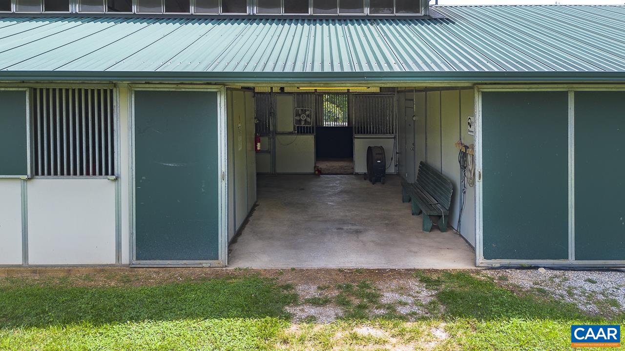 9195 Springwood Road Buchanan, VA 24066 - Photo 31 of 75 a view of a backyard with a patio and wooden fence