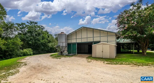 a dining table chair and window in a kitchen