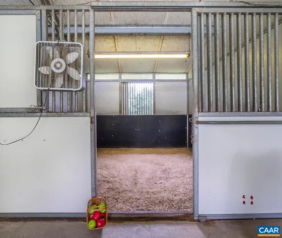 a bedroom with bed and window
