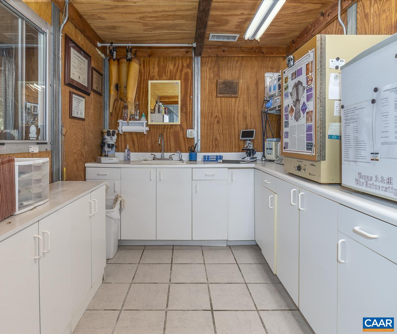 9195 Springwood Road Buchanan, VA 24066 - Photo 43 of 75 a view of a kitchen with a sink and cabinets