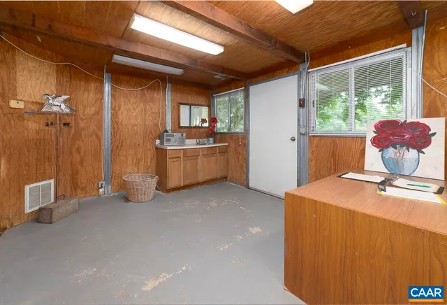 a view of a lake with a house