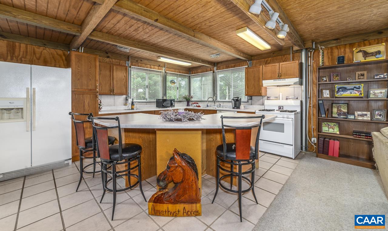 9195 Springwood Road Buchanan, VA 24066 - Photo 52 of 75 a dining table chair and window in a kitchen