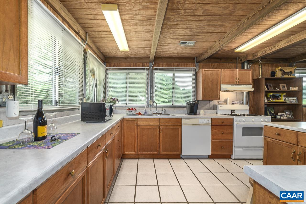 9195 Springwood Road Buchanan, VA 24066 - Photo 55 of 75 a kitchen with a sink a stove and cabinets
