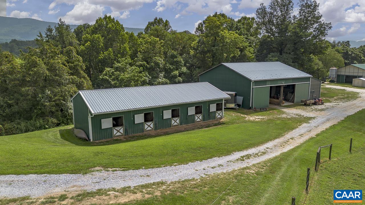 9195 Springwood Road Buchanan, VA 24066 - Photo 6 of 75 a front view of a house with garden
