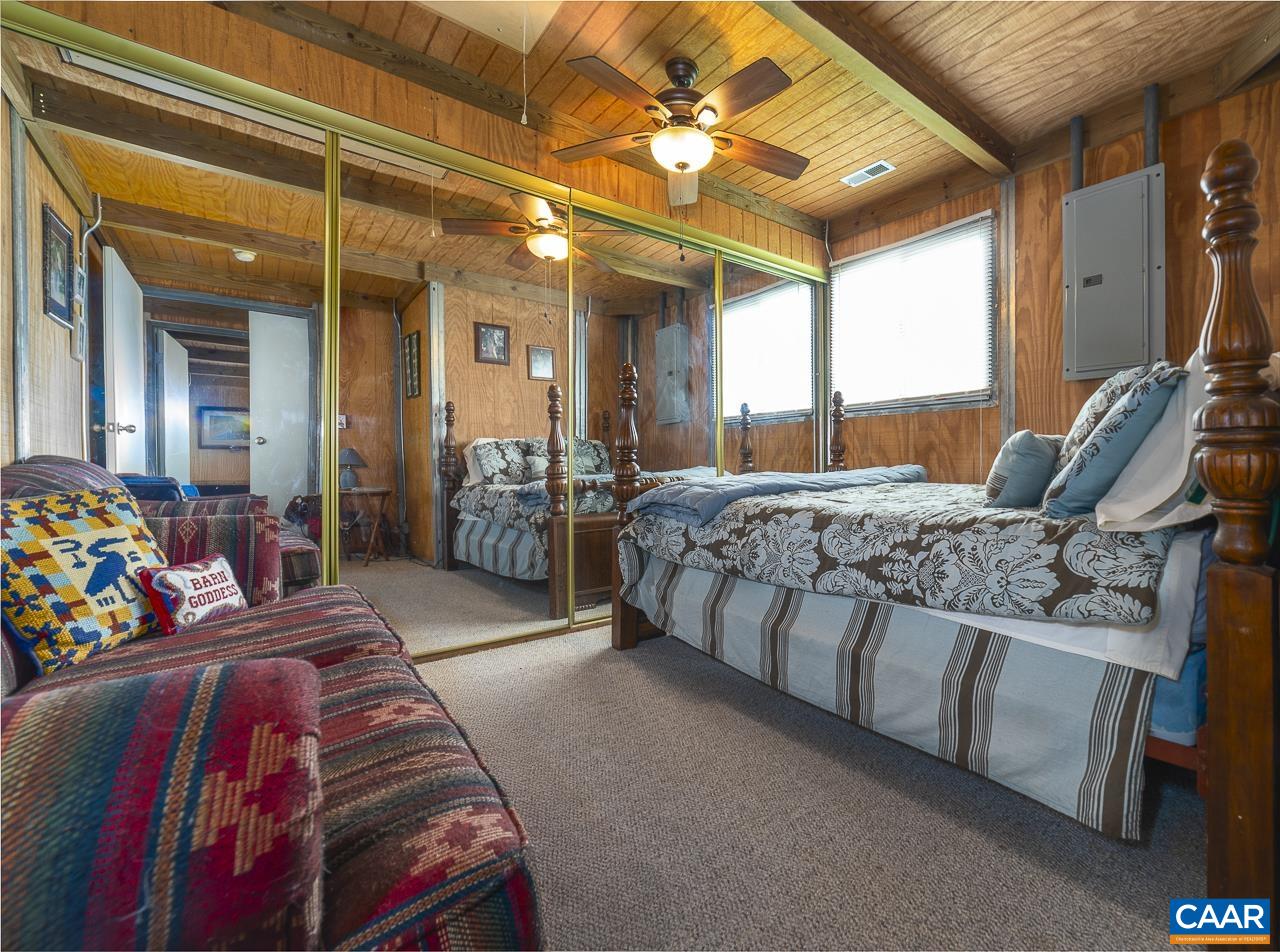 9195 Springwood Road Buchanan, VA 24066 - Photo 62 of 75 a bedroom with bed and window